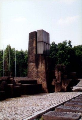 Memorial at Auschwitz-Birkenau with plaques in different languages